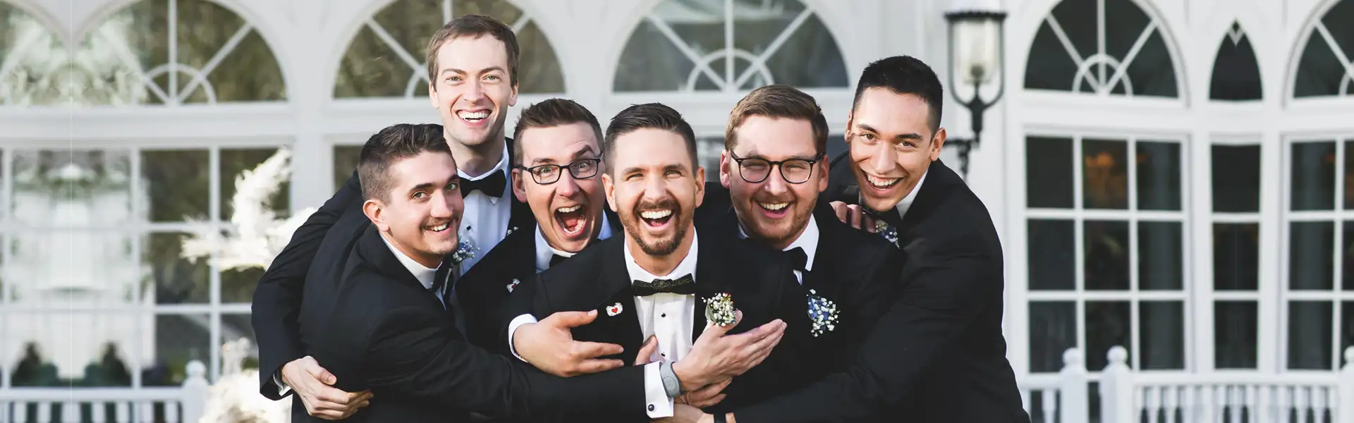 Wedding party excited about winning 5 free wedding tuxedos