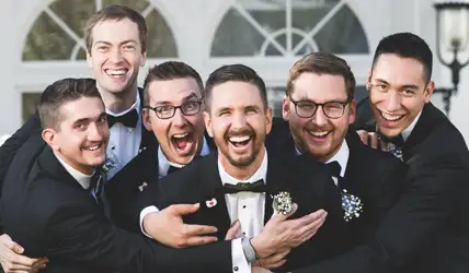 Wedding party excited about winning 5 free wedding tuxedos