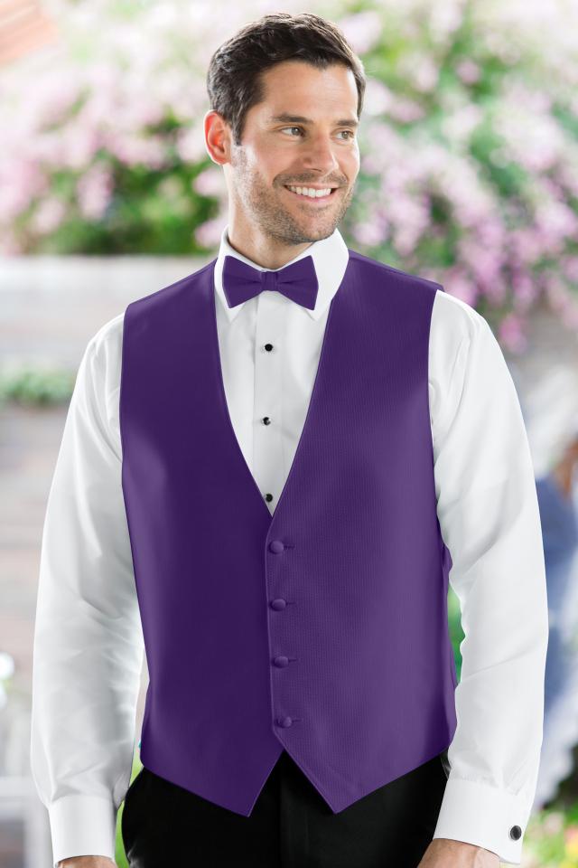 white tuxedo with purple vest and tie