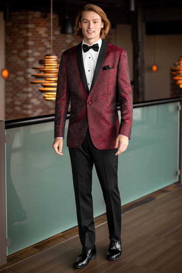 Going into prom in the Prom Tuxedo Apple Red Paisley Mark of Distinction Aries