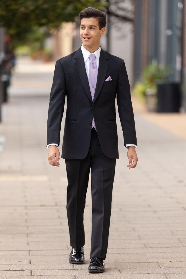 Guy walking down the street in a Prom Tuxedo Black Emerson